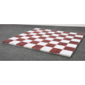 Sleek 15 inch red and white stone chess board in a minimalist borderless design.