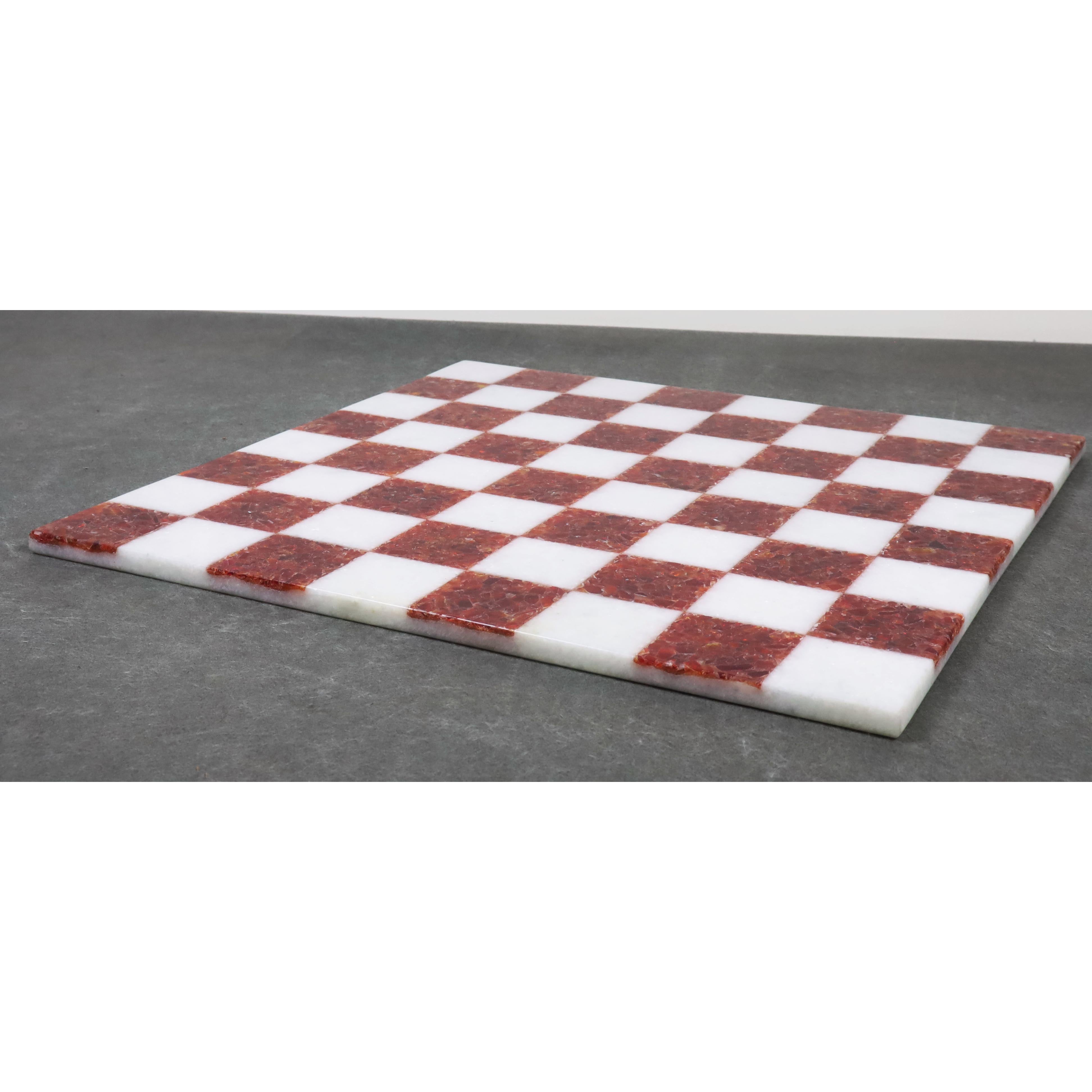 Sleek 15 inch red and white stone chess board in a minimalist borderless design.