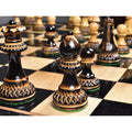 Finely detailed burnt boxwood queen and bishop pieces from the Parker Staunton collection.