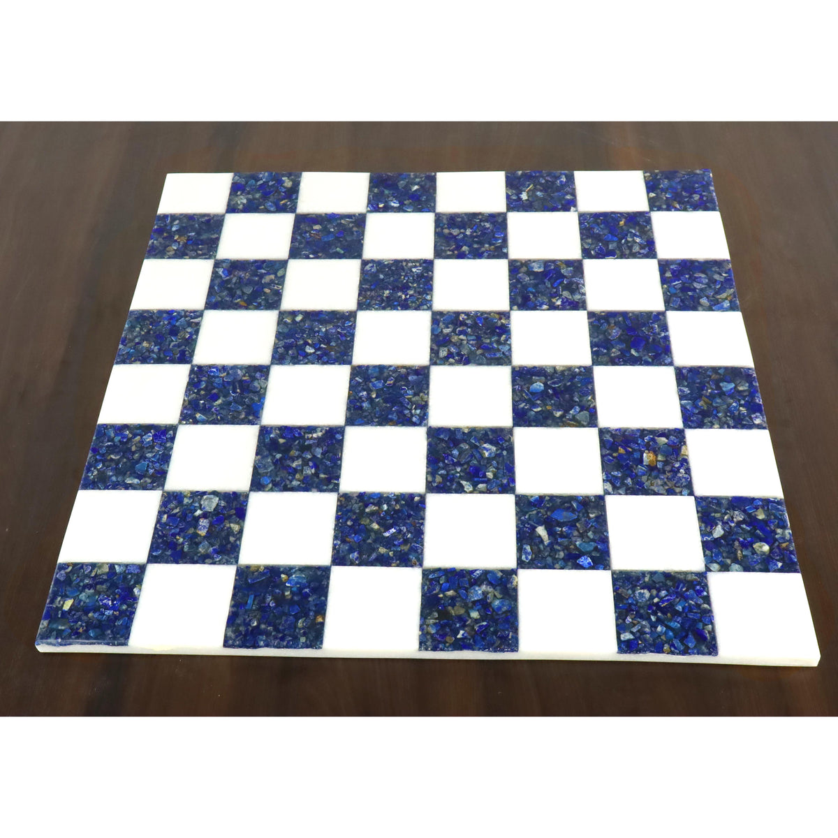 Top view of an 18 inch square marble stone chess board with blue lapis lazuli and white squares.