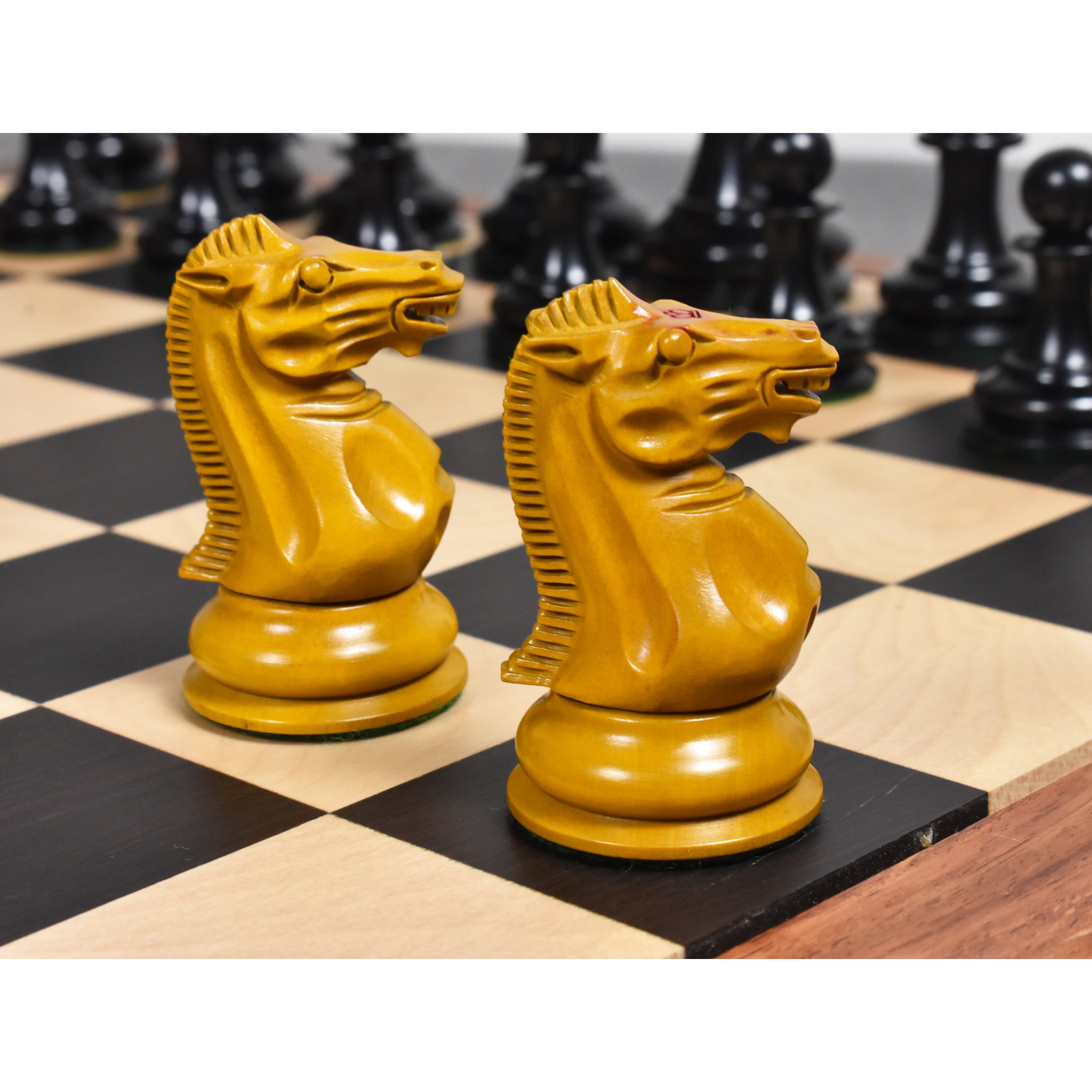 Close-up of the intricate hand-carved manes of the 1849 Jacques Cook boxwood knights.