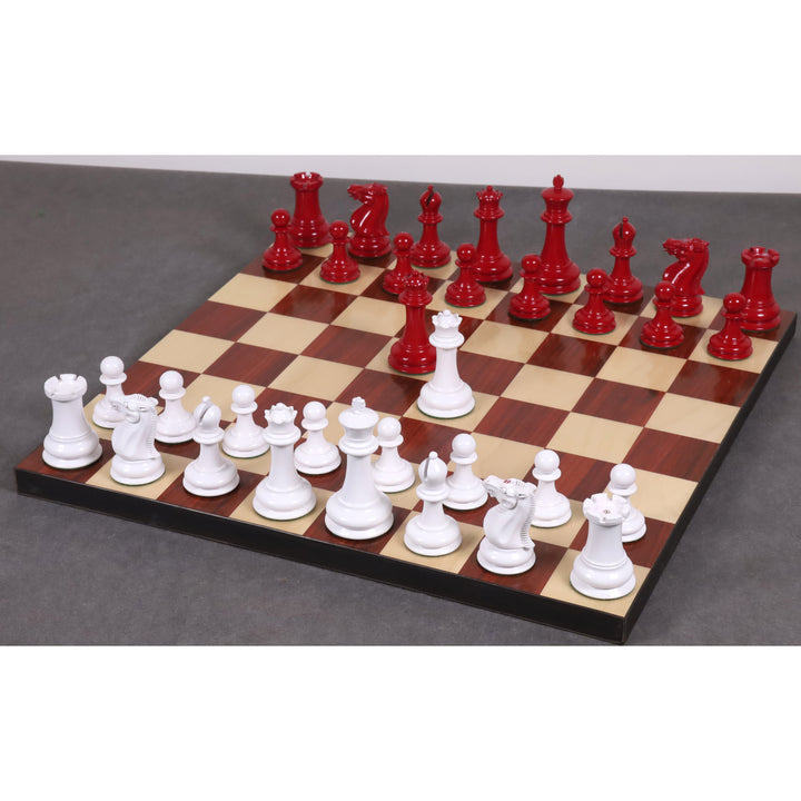 1849 Jacques Cook Staunton red and white collectors chess set arranged on a wood board.