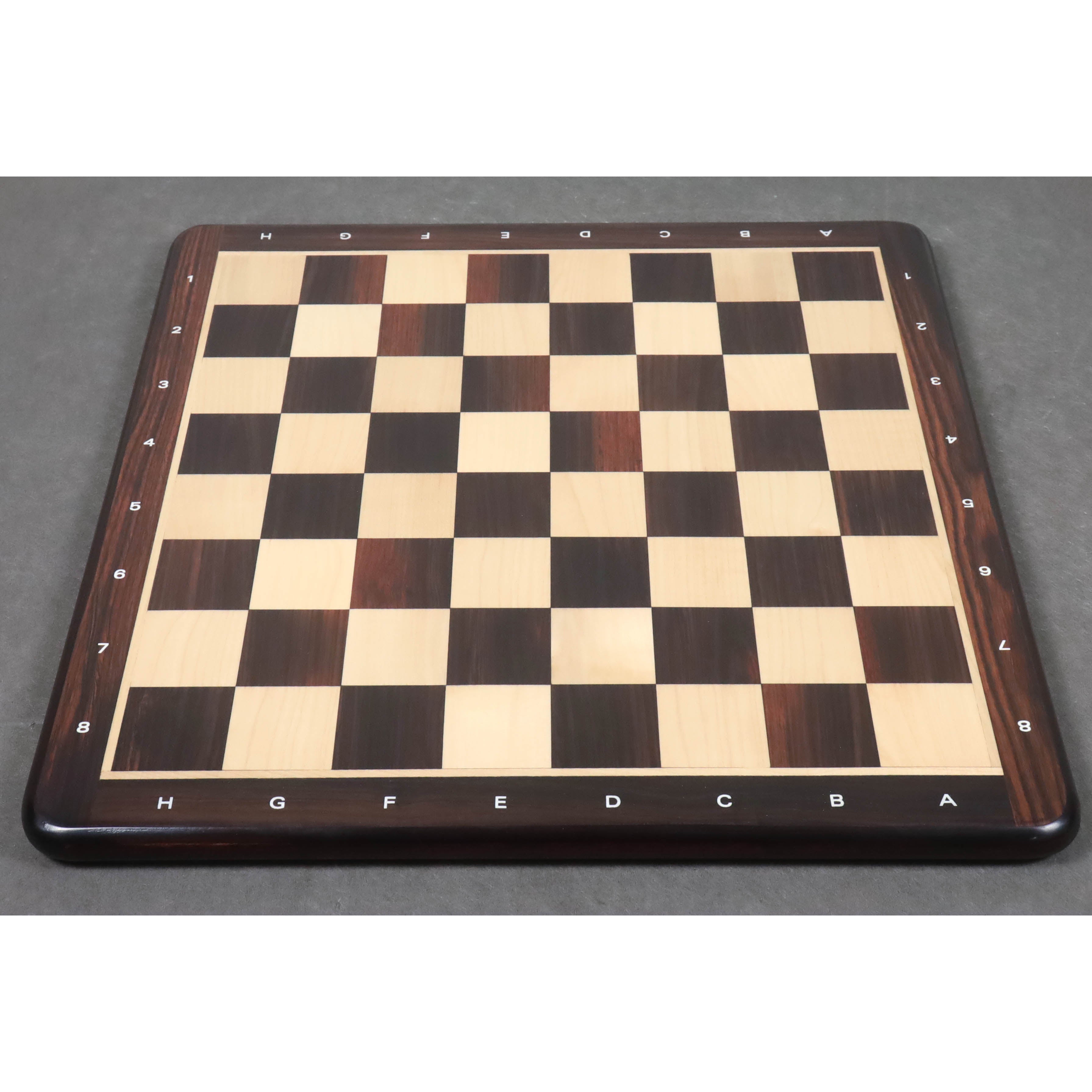 Full top view of a 19 inch flat rosewood and maple chessboard with 50mm squares.