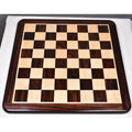 Top-down view of a 19-inch flat chess board crafted from solid rosewood and maple wood.
