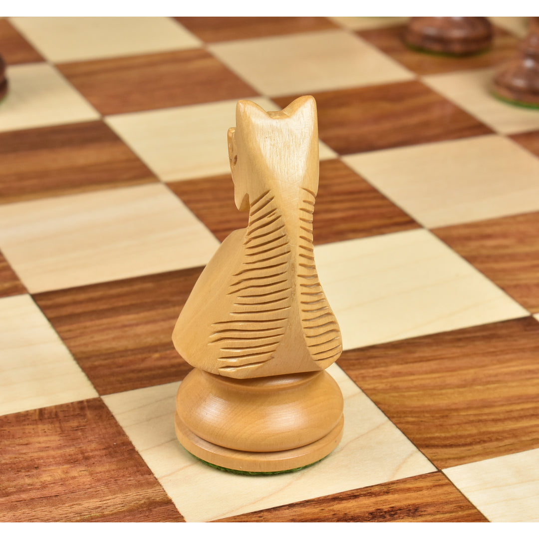 Rear view of a 4.1 inch Boxwood Knight from the 1920s German Collectors set on a wooden board.