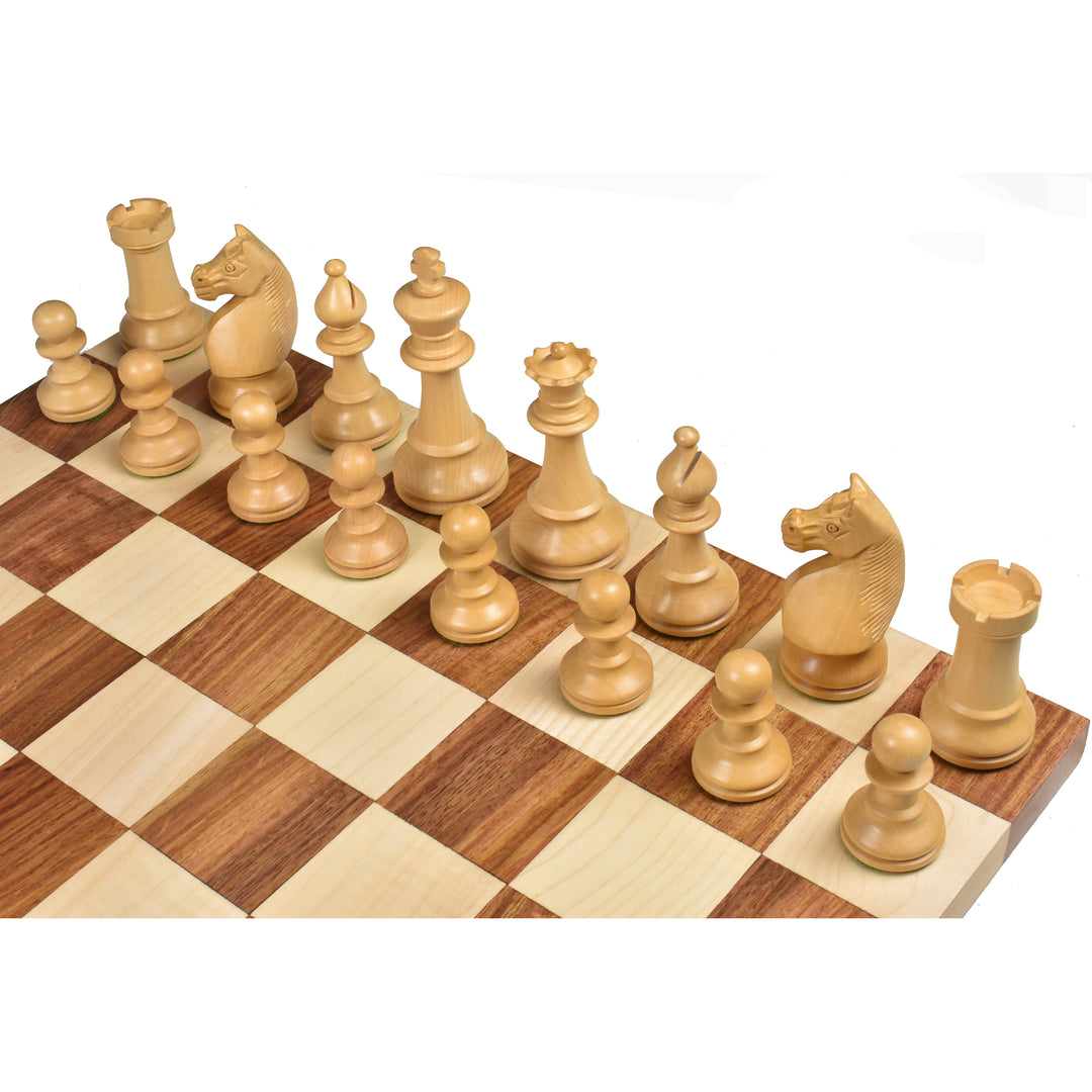Full side view of Boxwood chess pieces from the 1920s German Collectors set on a chess board.