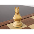 Front view of a hand-carved Boxwood Knight from the 1933 Botvinnik Flohr Soviet chess set.