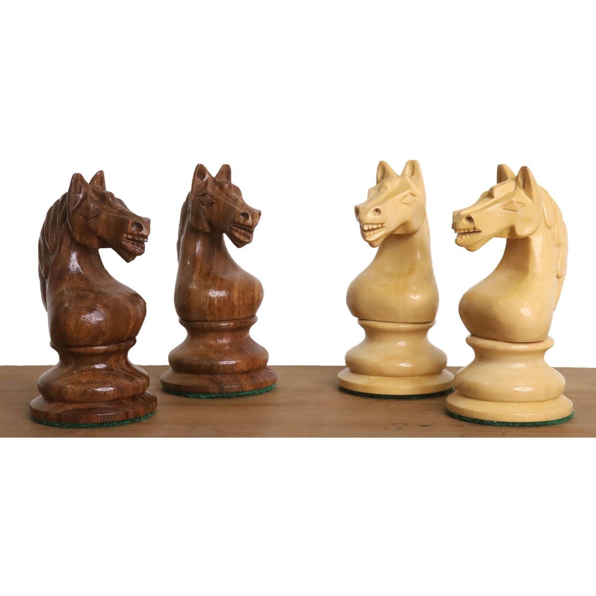 Detailed view of the uniquely carved Soviet-style knights in golden rosewood and boxwood.