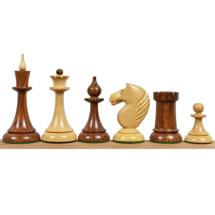 Soviet Latvian reproduction chess pieces in golden rosewood and boxwood showing slender stems.