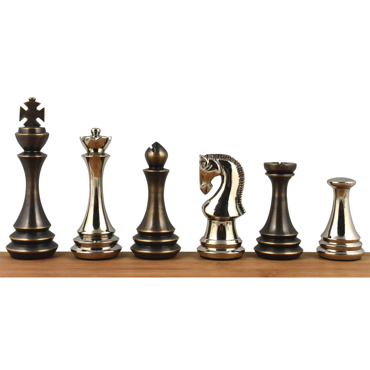 Six Russian Zagreb metal luxury chess pieces in silver and antique finish standing on a wooden bar.
