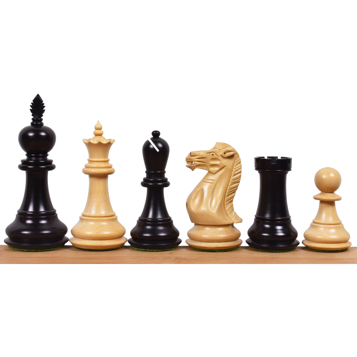 A full set of weighted executive staunton chess pieces in ebonised boxwood and boxwood.