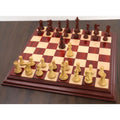 Full layout of the weighted bud rosewood and boxwood chess set arranged on a matching luxury wooden board.