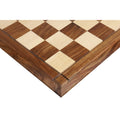 Close-up detail of the corner and grooved border of the 23" Players Choice Golden Rosewood and Maple wood chess board.