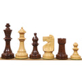 A profile lineup of dark Anjan rosewood and light boxwood Pinney Staunton chess pieces.