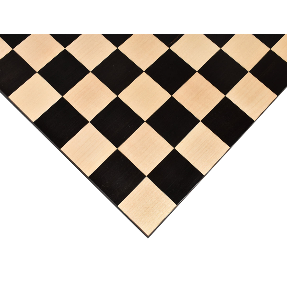 High-angle corner view of a premium ebony and maple wood chess board surface.
