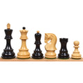 3.9 inch Russian Zagreb chess pieces in ebonized wood and natural boxwood lined up.