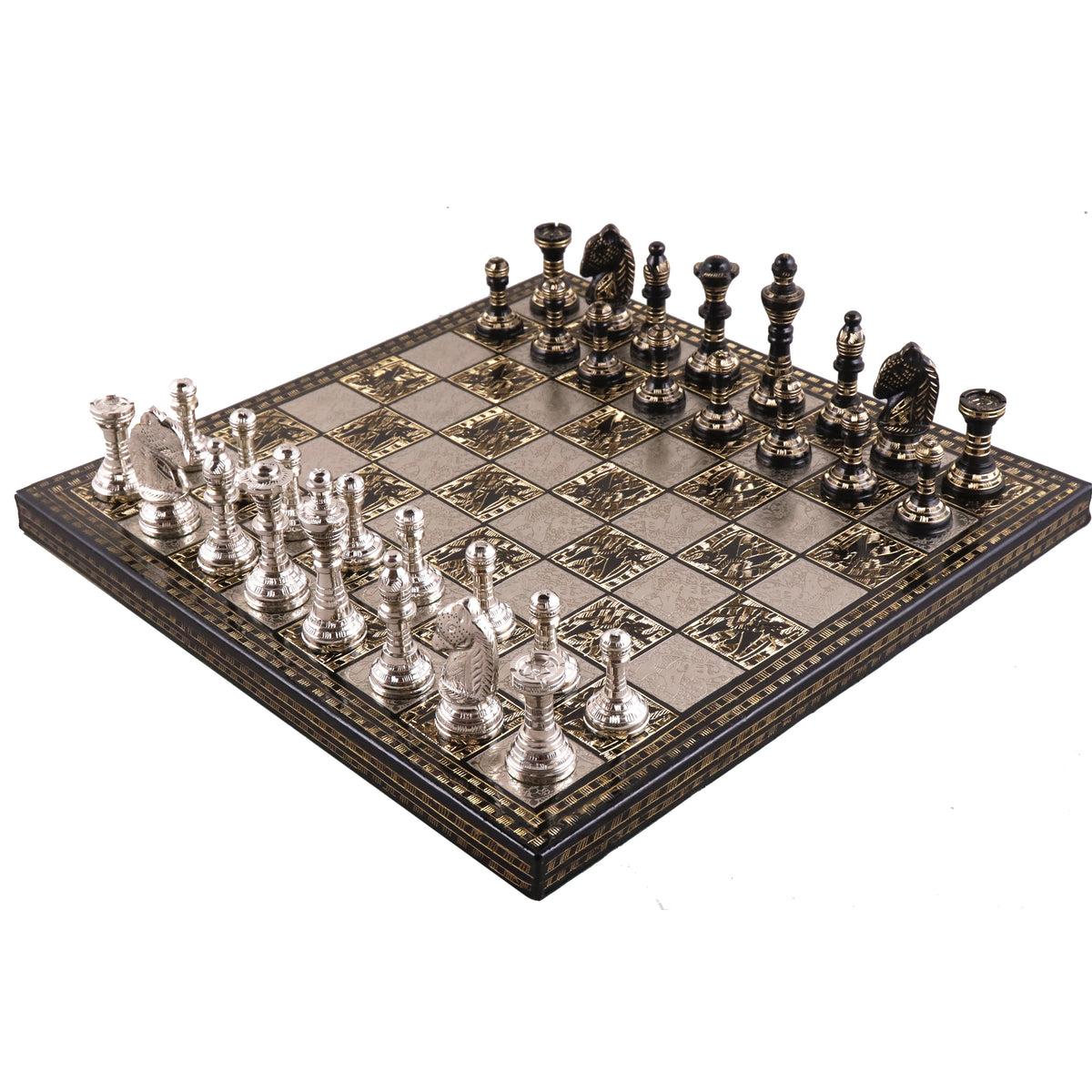 A complete 12" luxury brass chess set featuring polished silver and black pieces arranged on its intricately engraved metallic board.