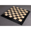 21-inch ebony and maple luxury chess board with intricate carved border.