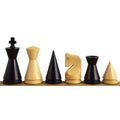 Row of 3.1 inch Russian Poni minimalist chess pieces in ebonised boxwood and natural boxwood.