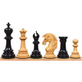 A selection of Mogul Staunton ebony and boxwood chess pieces showcasing the intricate carving.