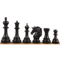 A complete lineup of the ebony wooden chess pieces from the 4.6" Prestige Luxury Staunton set.