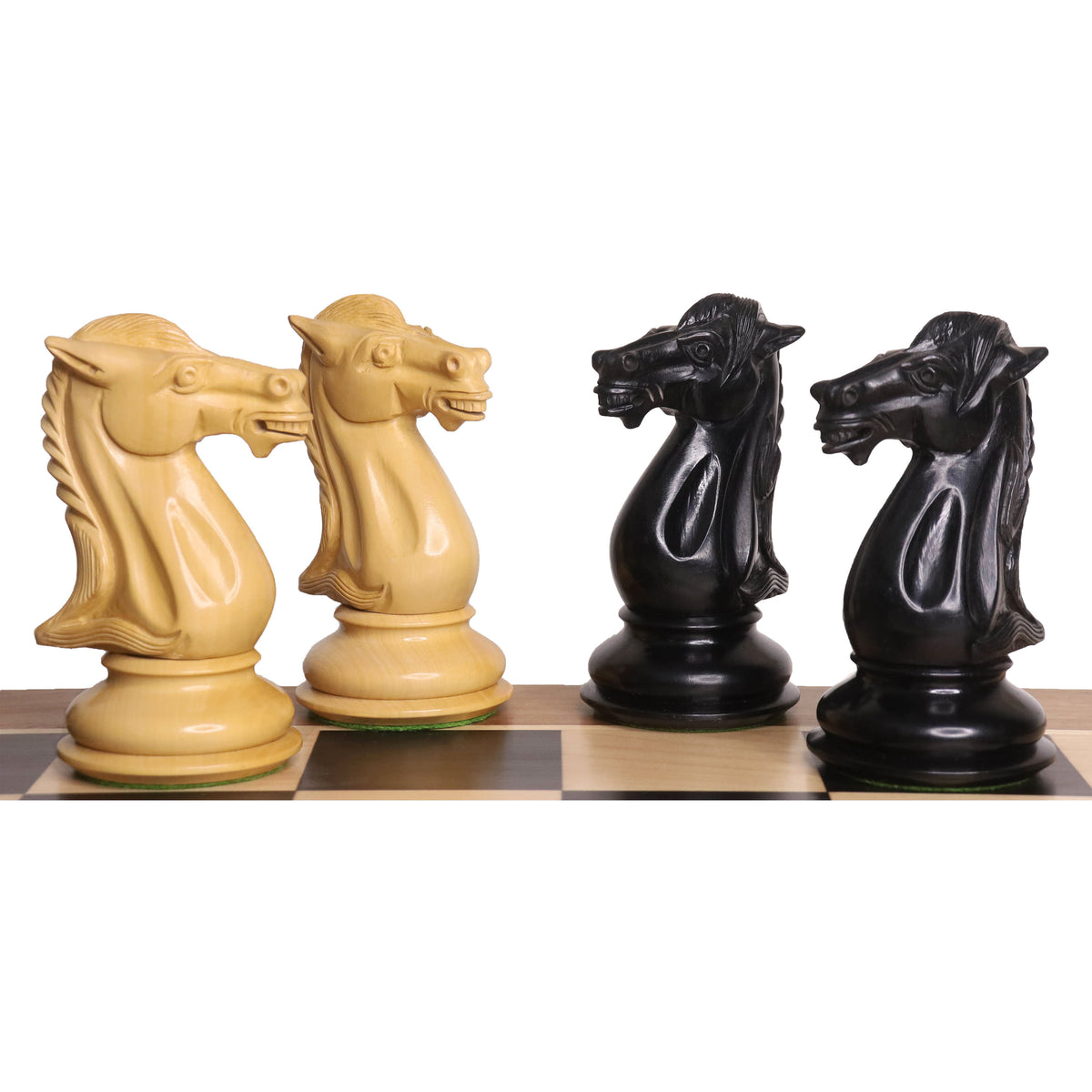 Hand-carved knights from the 6.1" Mammoth Luxury Staunton set in ebony and boxwood.