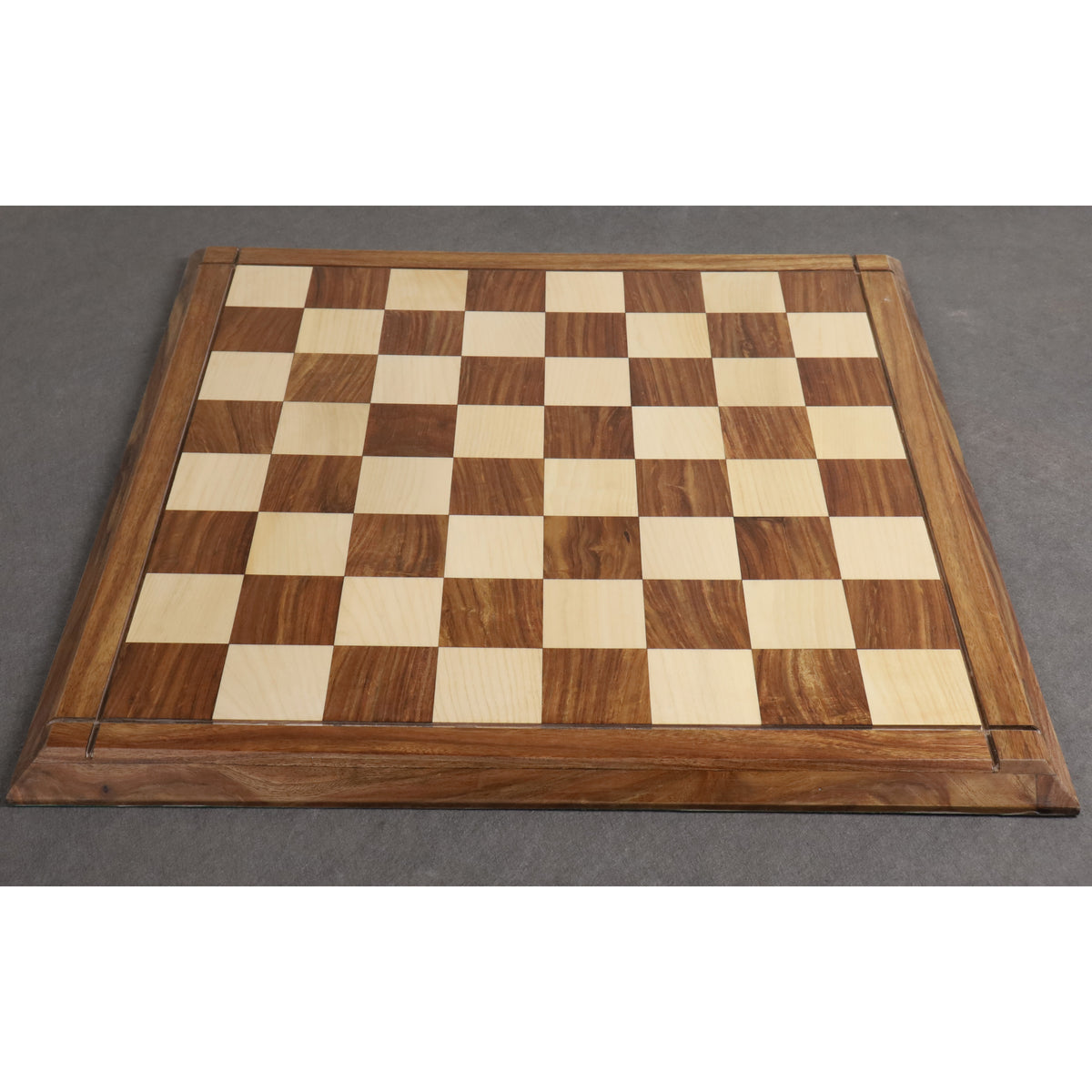 Top-down perspective of the 23" Players Choice chess board featuring 60mm squares in Golden Rosewood and Maple.