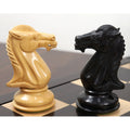 Side-by-side comparison of the ebony and boxwood knight carvings in the Mammoth Luxury set.