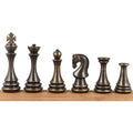 Full set lineup of 4.4 inch antique brass metal luxury chess pieces from king to pawn against white backdrop.