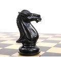 Close-up of the intricately carved ebony knight from the Mammoth Luxury Staunton set.