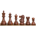 Golden rosewood Reykjavik series wooden chess pieces arranged linearly from king to pawn.