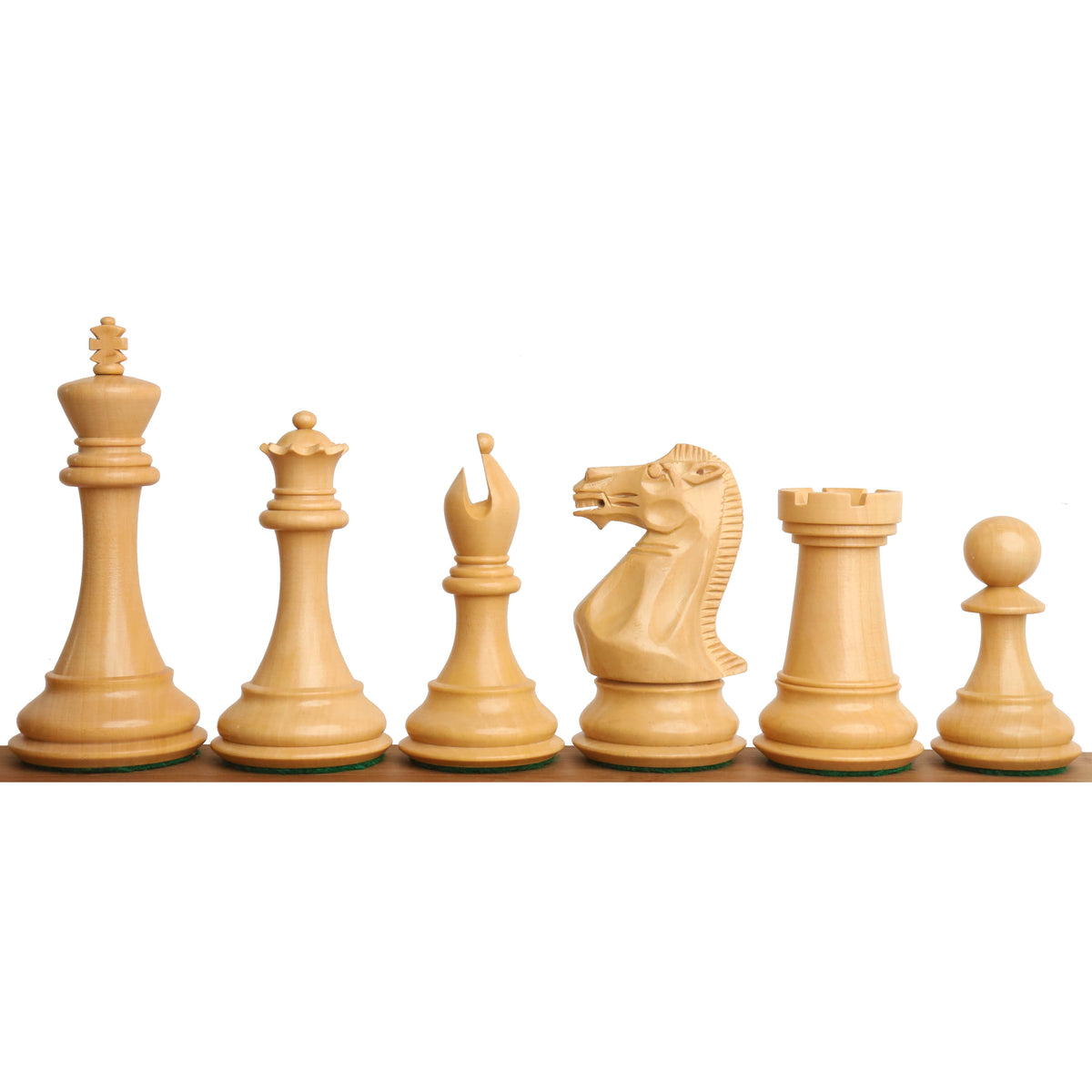 Six natural cream boxwood sleek Staunton luxury chess pieces standing in a uniform row.