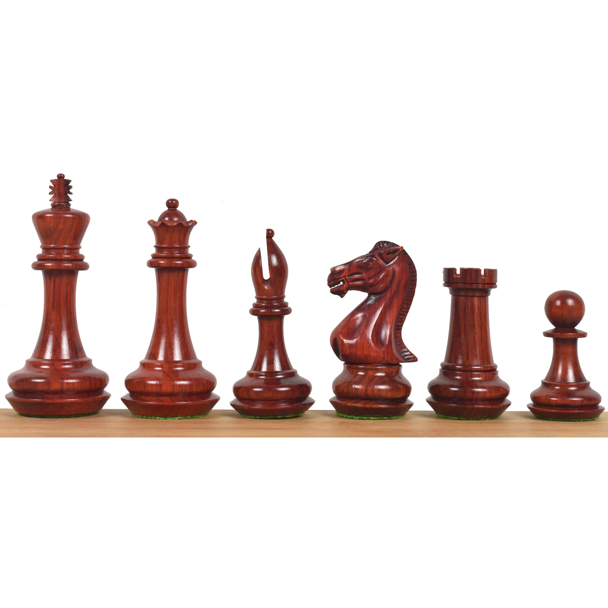 Lineup of dark Bud Rosewood 4.1" Chamfered Base Staunton chess pieces.