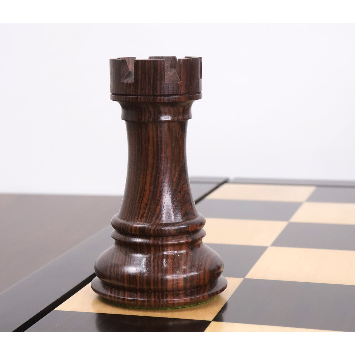 Single dark rosewood rook piece from the 6.1 inch Mammoth Luxury set.