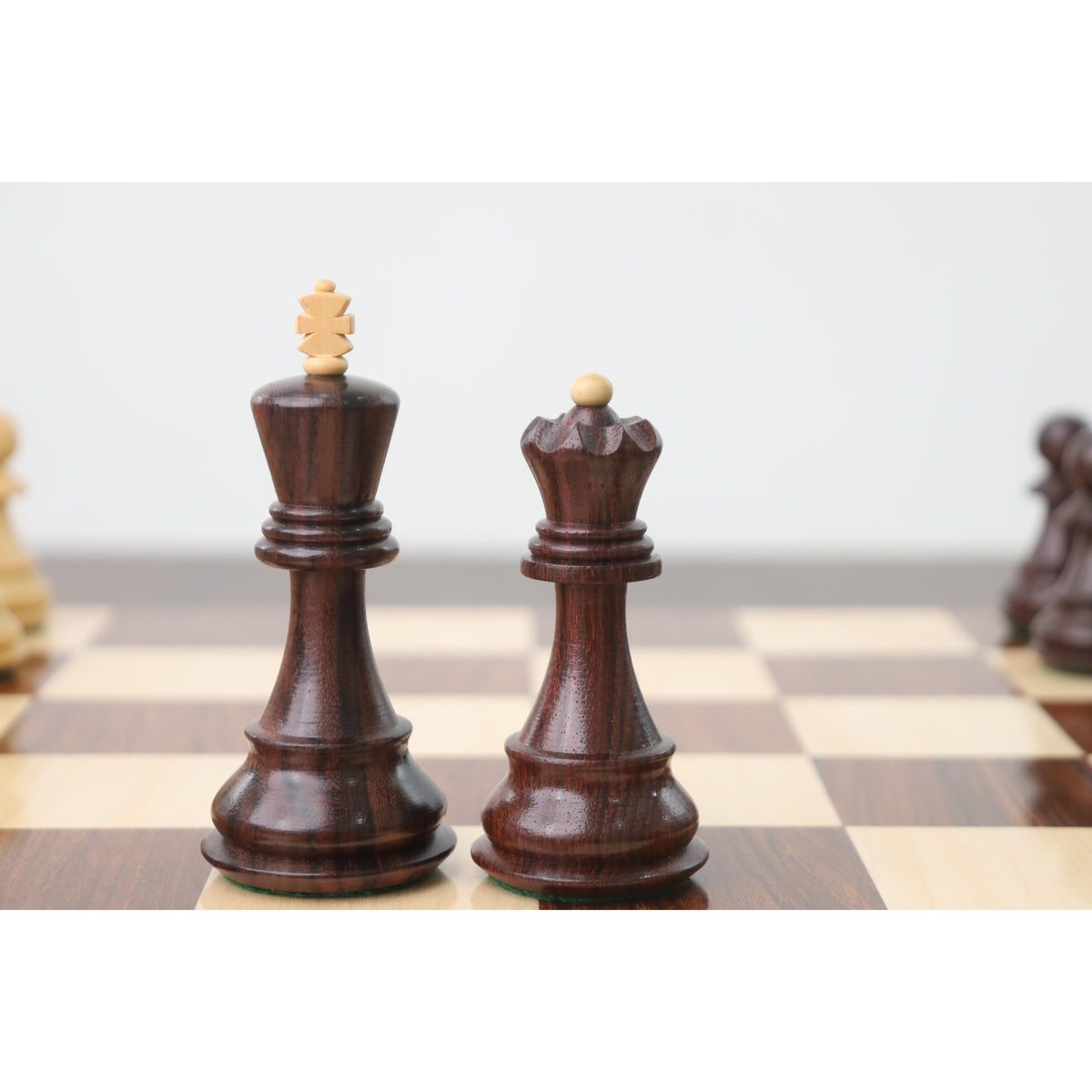Premium 3.9 inch Russian Zagreb rosewood king and queen pieces with contrasting finials.
