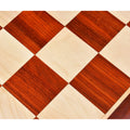Close-up of alternating Maple and Bud Rosewood playing squares showing detailed natural wood grain.