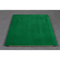 The underside of a luxury wooden chessboard featuring a high-quality green felt base for surface protection.