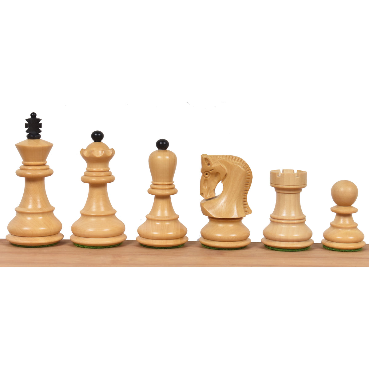 Collection of natural boxwood Russian Zagreb chess pieces featuring traditional Staunton-style design.