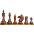 Weighted golden rosewood Alban Knight Staunton chess pieces displayed in a profile line.