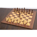 Complete 4 inch Bridle Staunton luxury chess set arranged on a matching wooden chessboard.