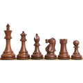 Six weighted golden rosewood classic Staunton chess pieces arranged sequentially from King to Pawn.