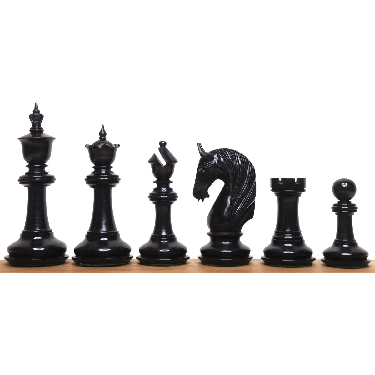 Triple-weighted ebony chess pieces from the 4.6-inch Bath Luxury Staunton set.