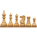 Light boxwood Staunton chess pieces lineup.