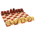 Reproduced 1923 Bauhaus chess set with bud rosewood and boxwood pieces on a board.