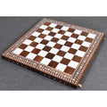 Angled view of the handcrafted Golden Rosewood and Acrylic Ivory inlaid folding chess board for professional play.