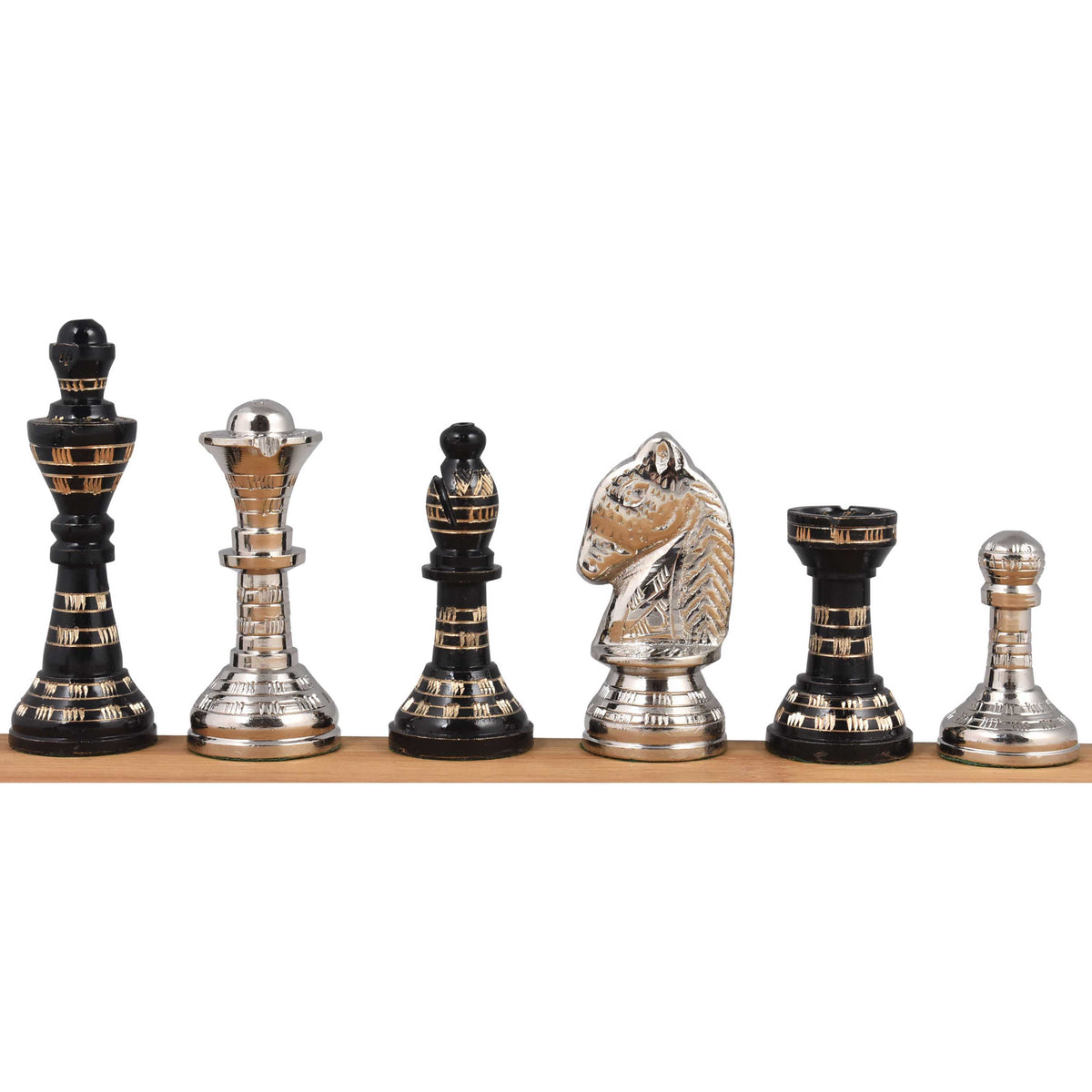 A profile lineup of the six unique silver and black Staunton-style brass chess pieces, displaying their intricate etched designs.