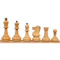 Light boxwood pieces from the Soviet Großmeister Supreme chess set arranged in a row.