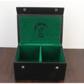 Open black leatherette chess storage box featuring green felt interior and brand logo.