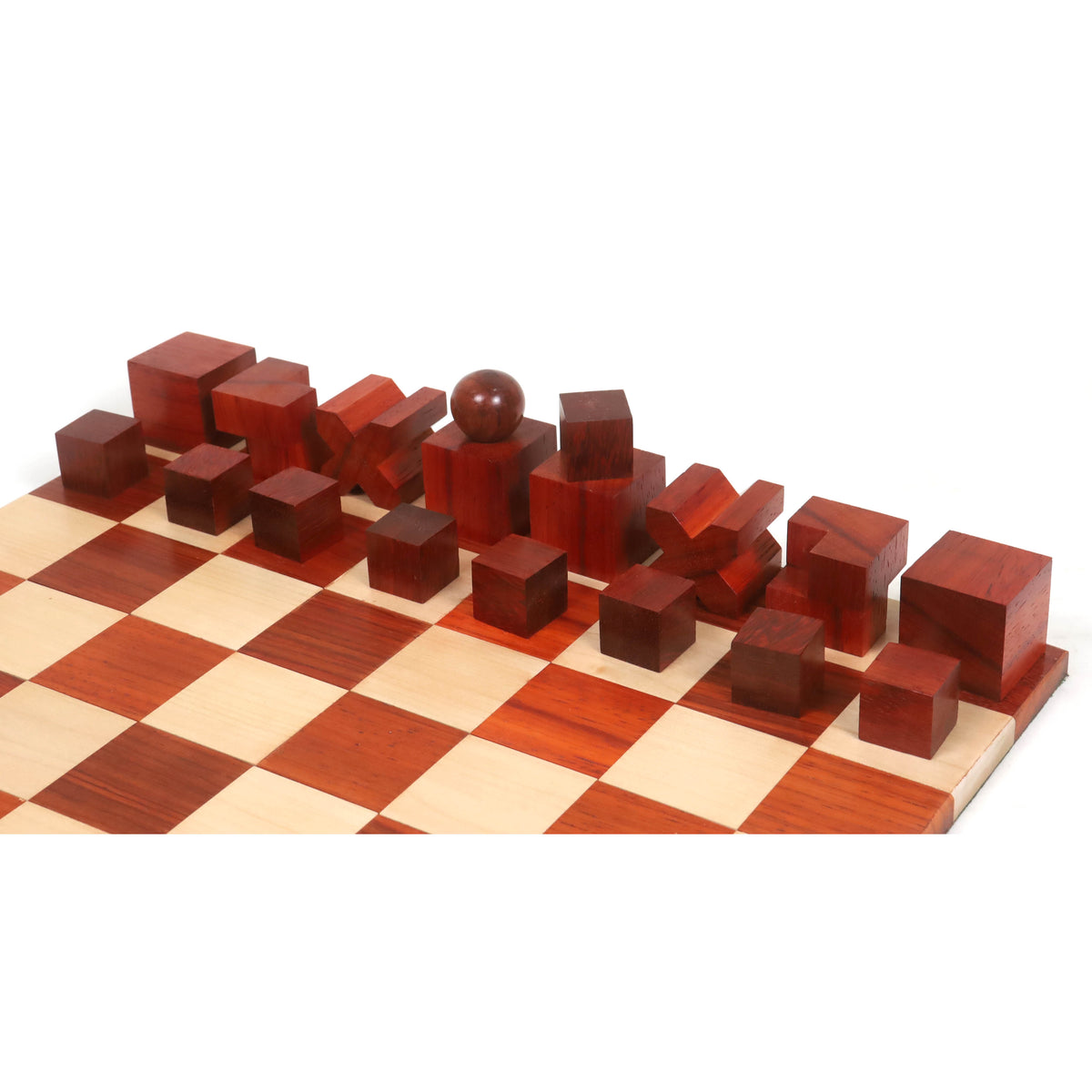 Bud rosewood Bauhaus chess pieces close-up view on a wooden chessboard.