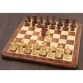 Complete golden rosewood and boxwood pieces from the Reykjavik Series Staunton chess set set up on a wooden board.